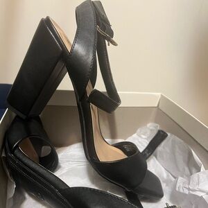 Closet clean out.   New day black heel.  Never worn